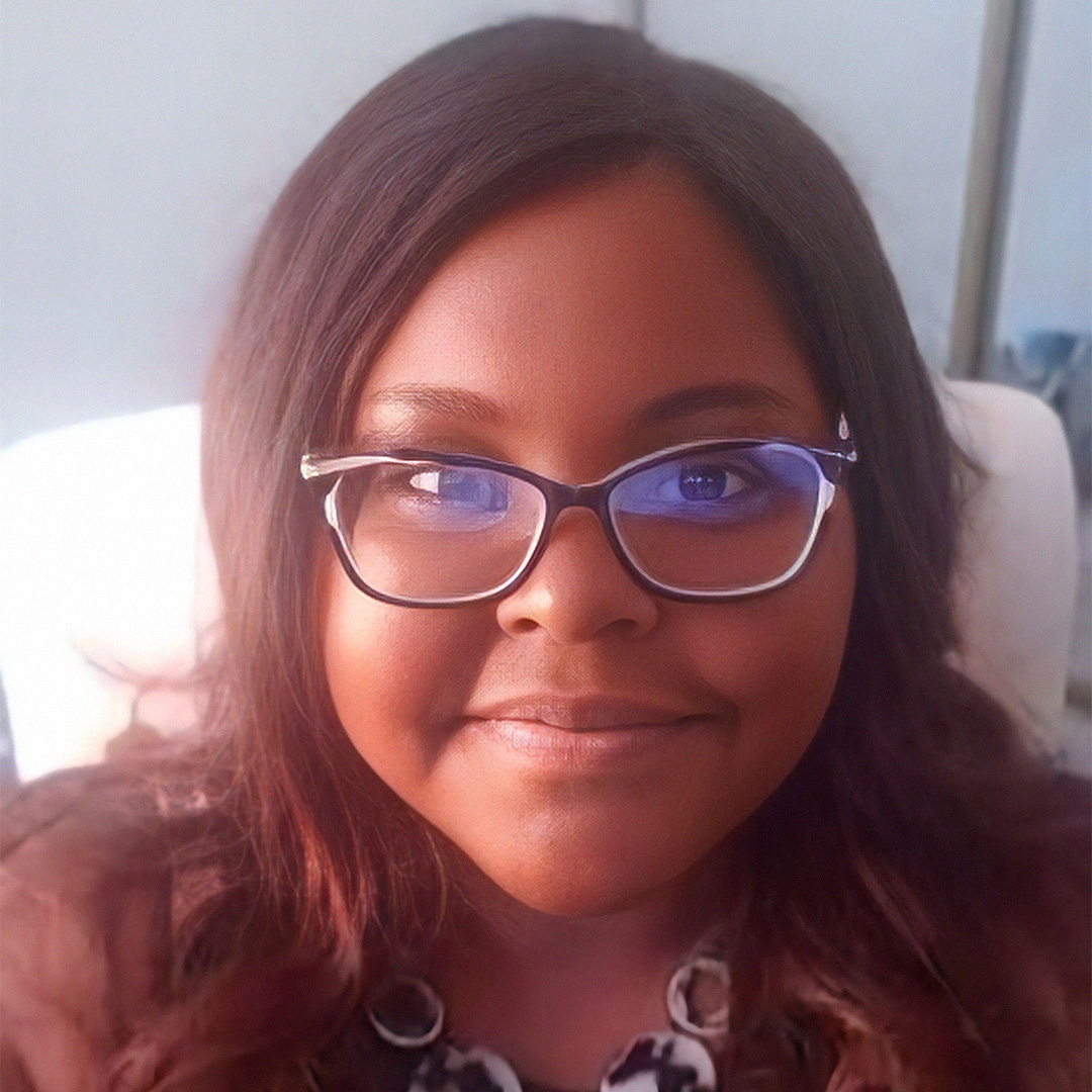 Rhea Bryant, BA (She / Her)